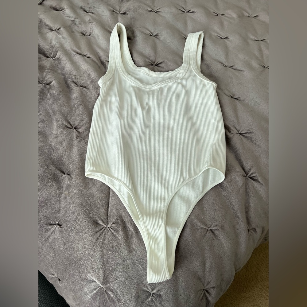 White stretchy thong bodysuit
